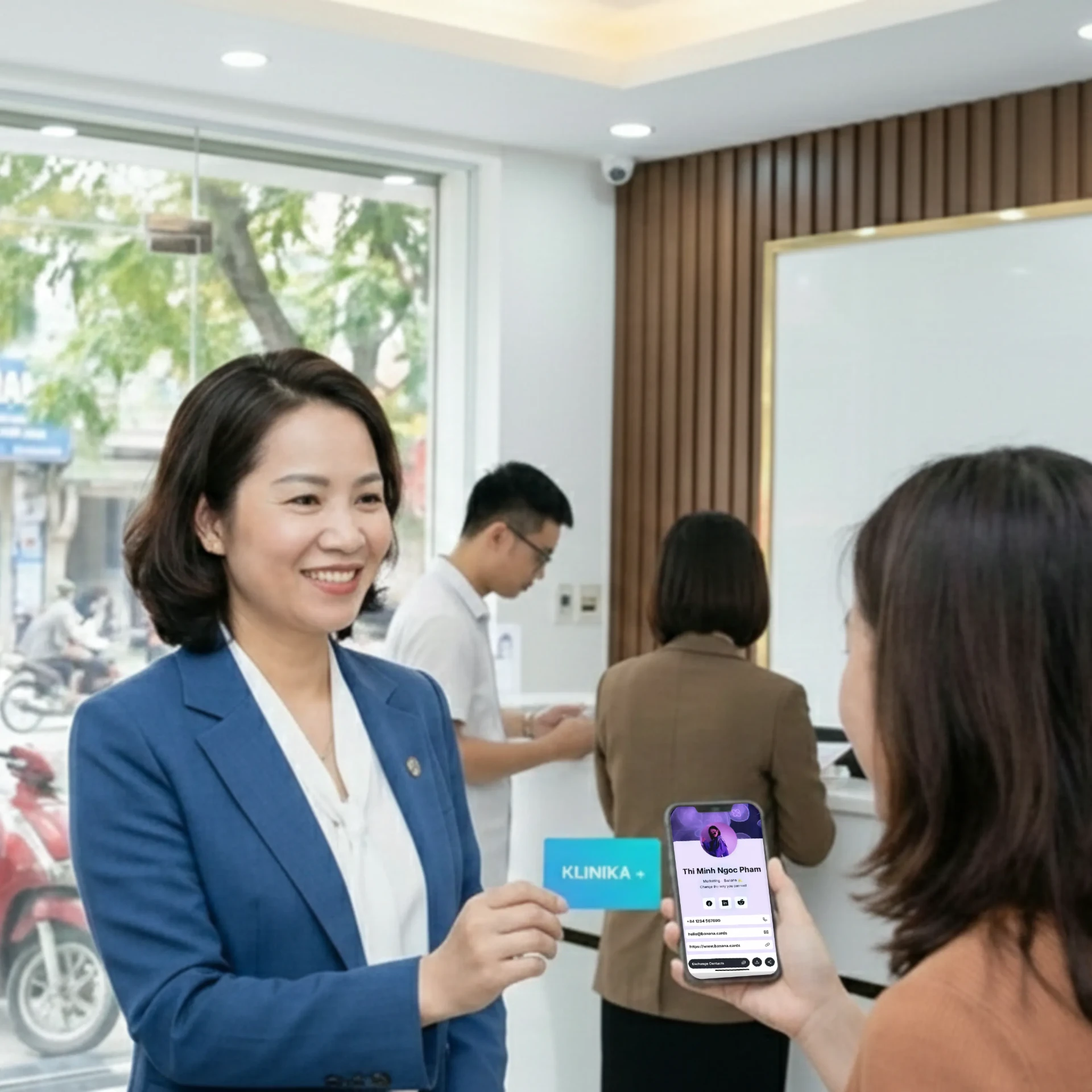 Field sales rep tapping a branded Banana NFC business card to a client's phone, capturing the lead into the CRM in seconds